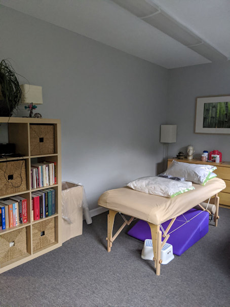 Inside Christine office, treatment table.